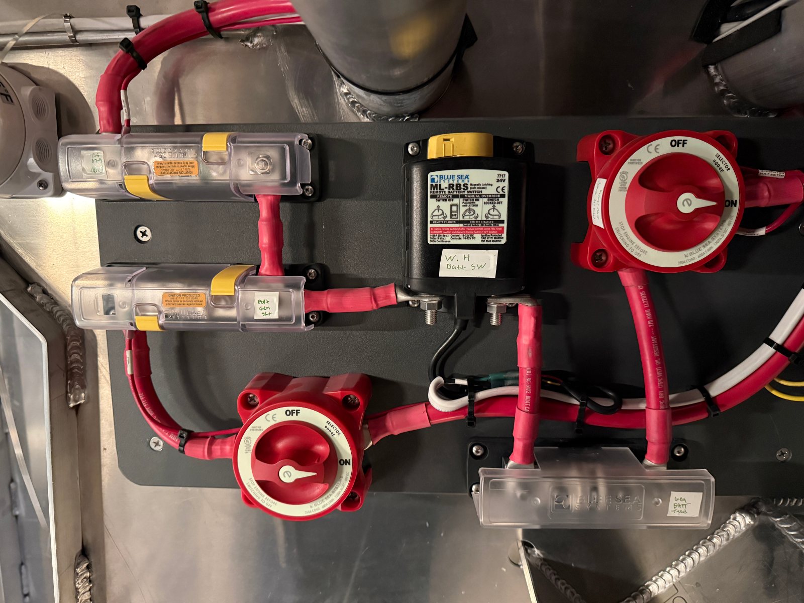 Battery switches and fuse blocks on a wiring panel