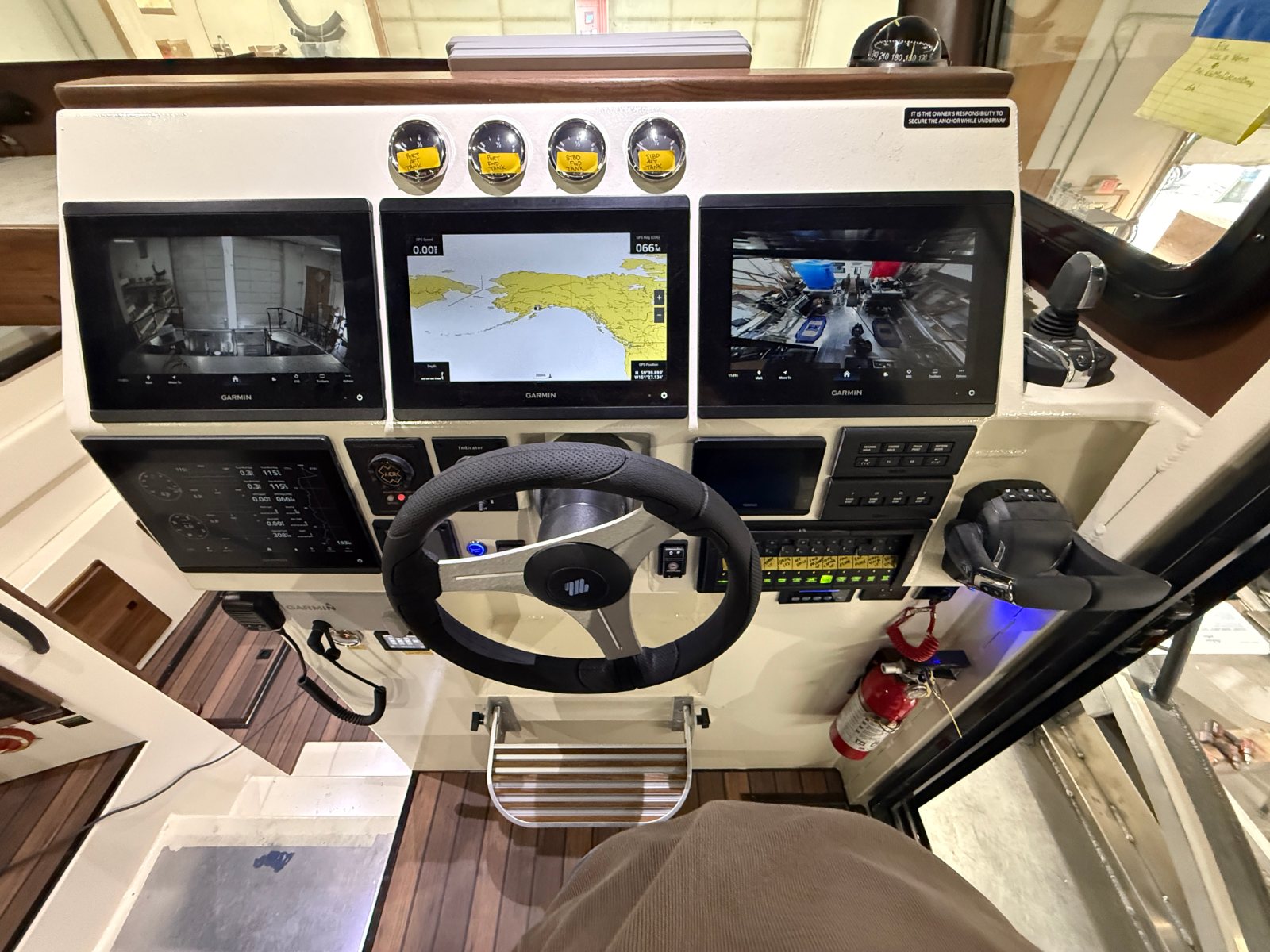 Finished helm with multifunction displays and wheel
